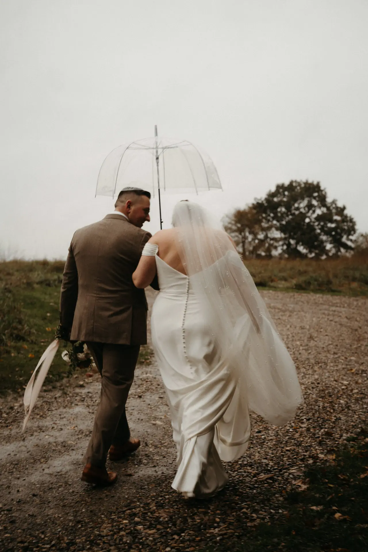 Taylor & Keegan’s Rainy June Farms Wedding