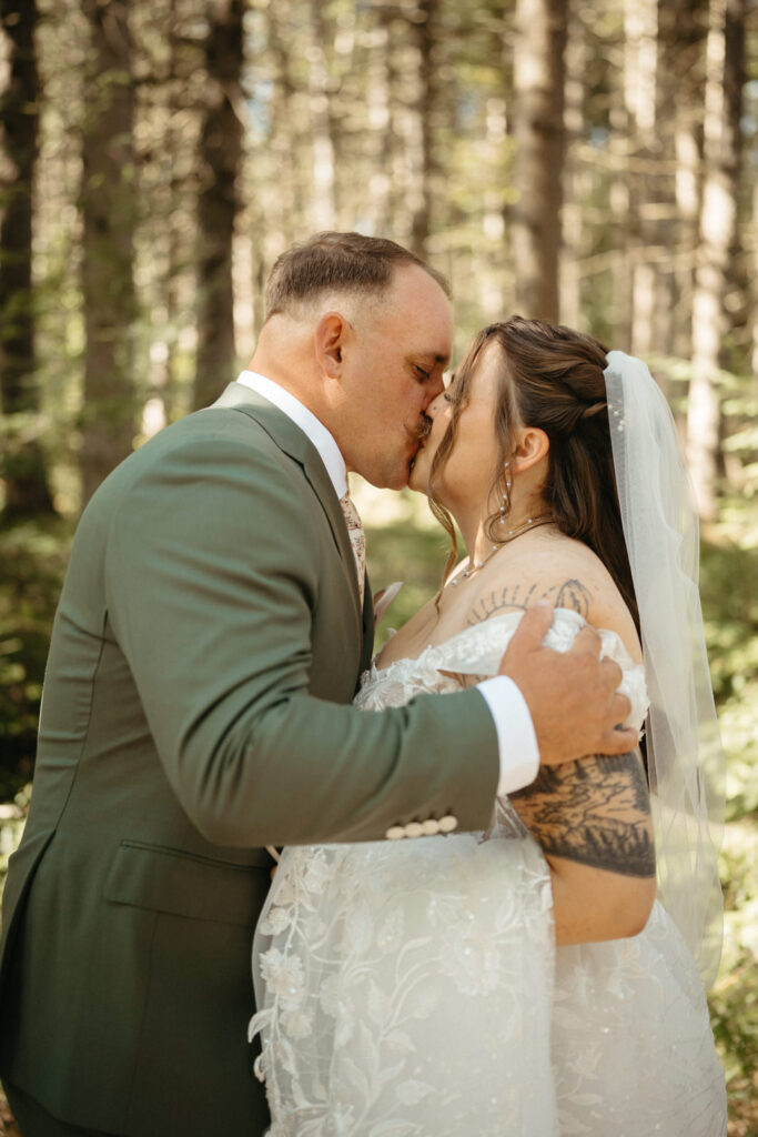 Couple kissing in a forest