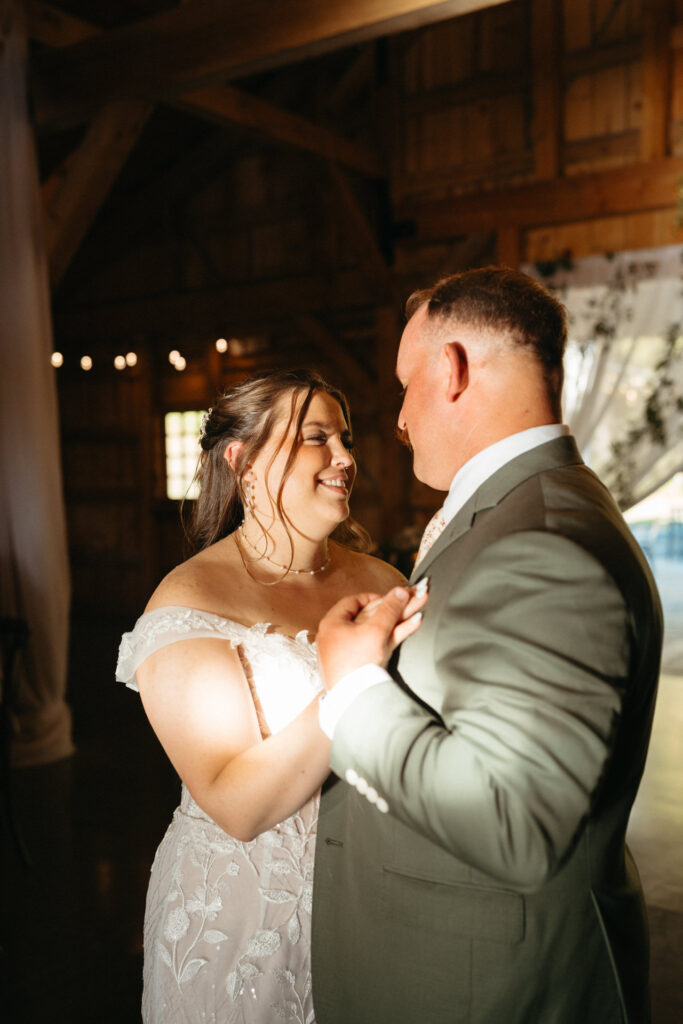 Couple sharing a slow dance in the barn