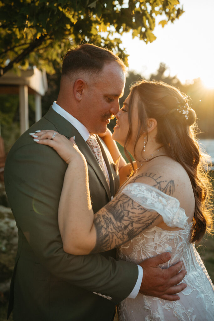 Couple about to kiss in warm sunset light