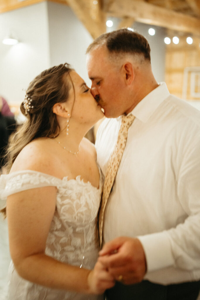 Couple kissing while dancing, close up