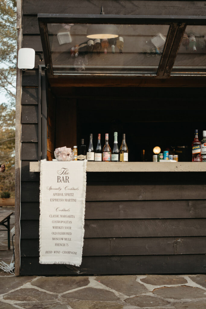 Outdoor bar with a menu sign