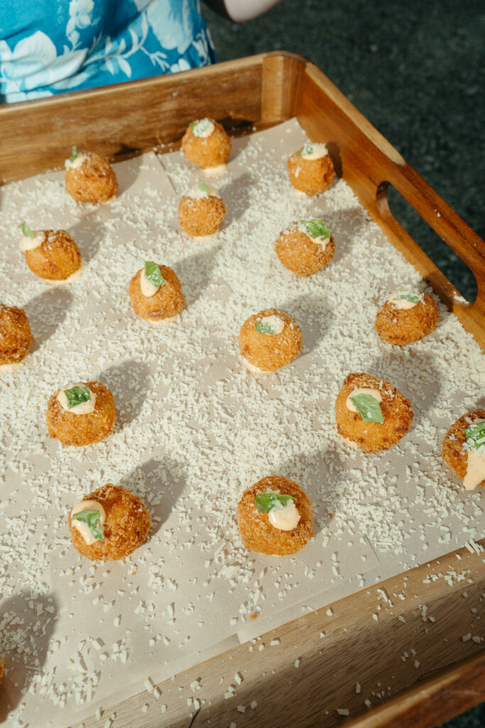 Tray of caviar scotch eggs on a bed of salt