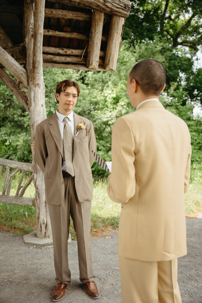 Couple facing each other under the gazebo roof