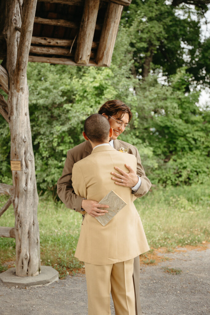Couple hugging under the gazebo