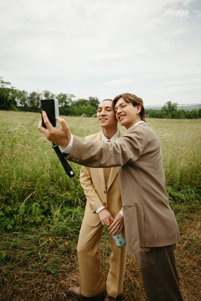 Couple taking a selfie in the meadow