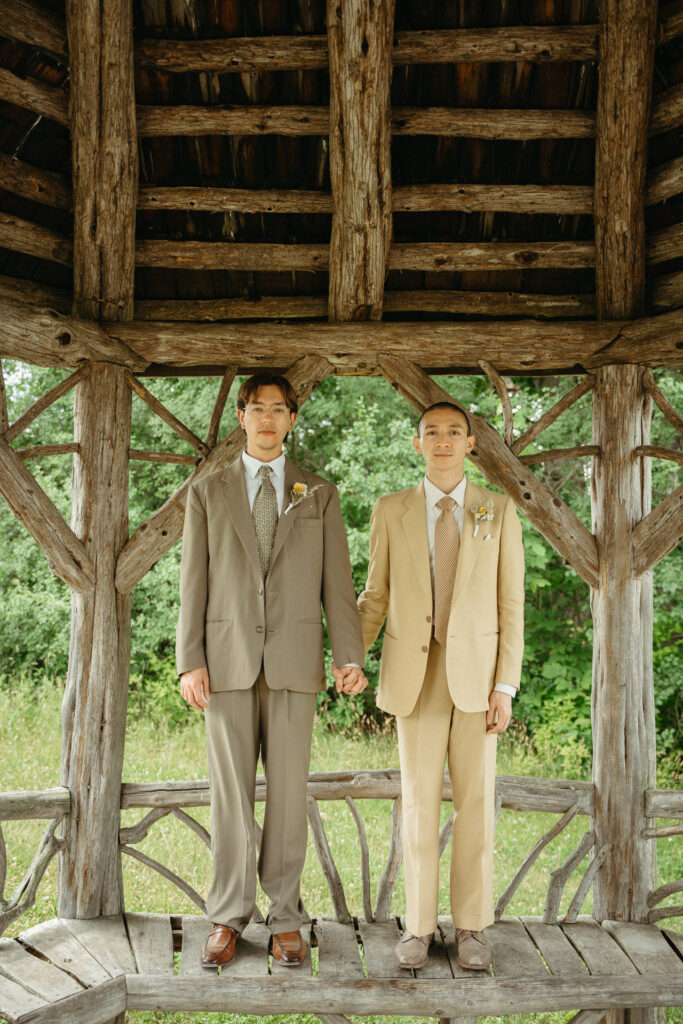 Couple standing on the gazebo's wooden platform